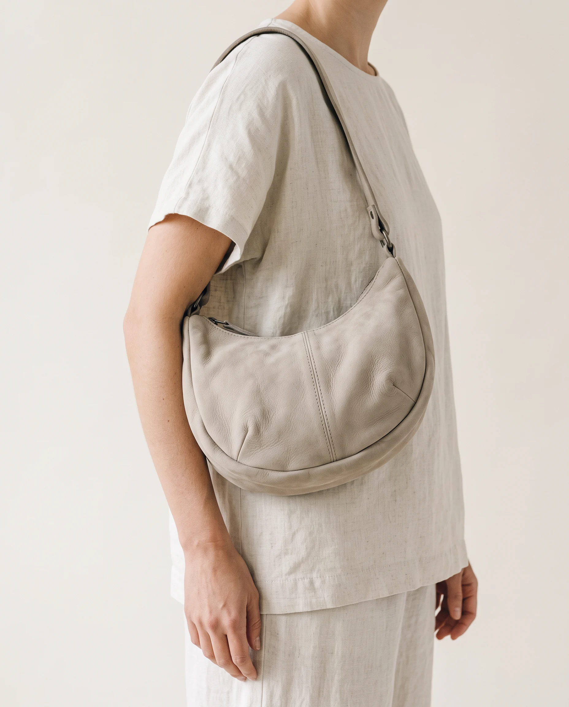 Crescent Shoulder Bag, carried